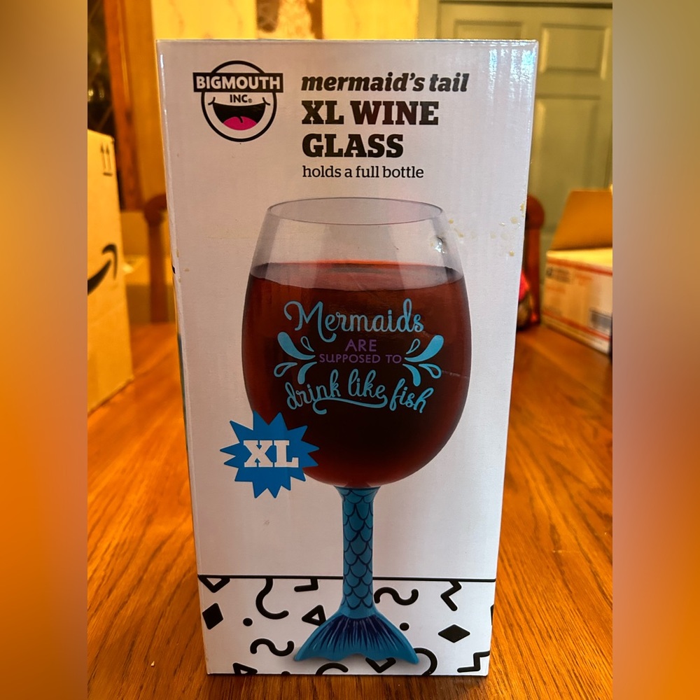 XL wine glass. Holds a whole bottle. Never used. Only opened once for photo